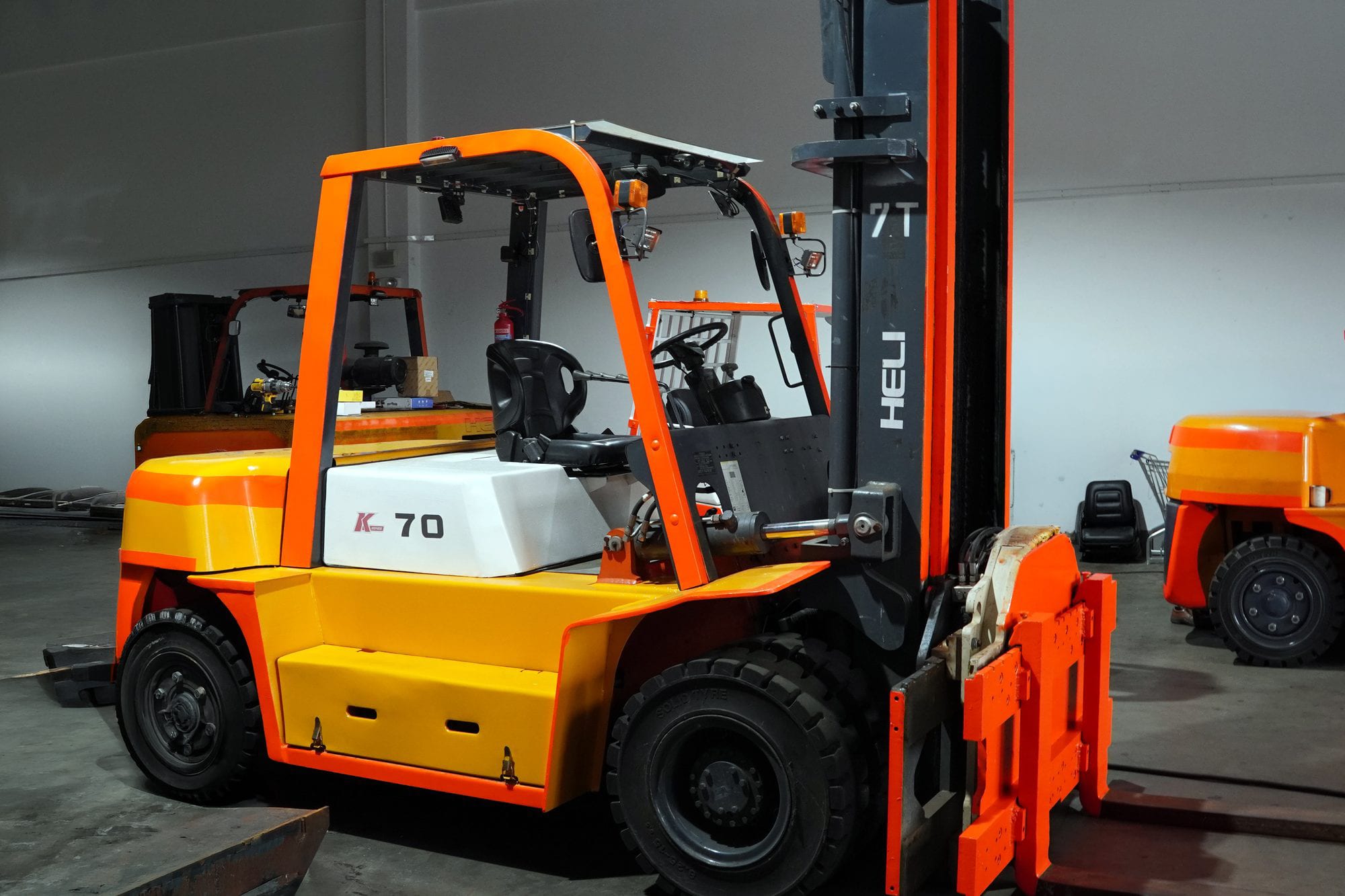 Heli CPCD70 7-tonne diesel forklift with 360° fork rotator at LB Industrial, Singapore